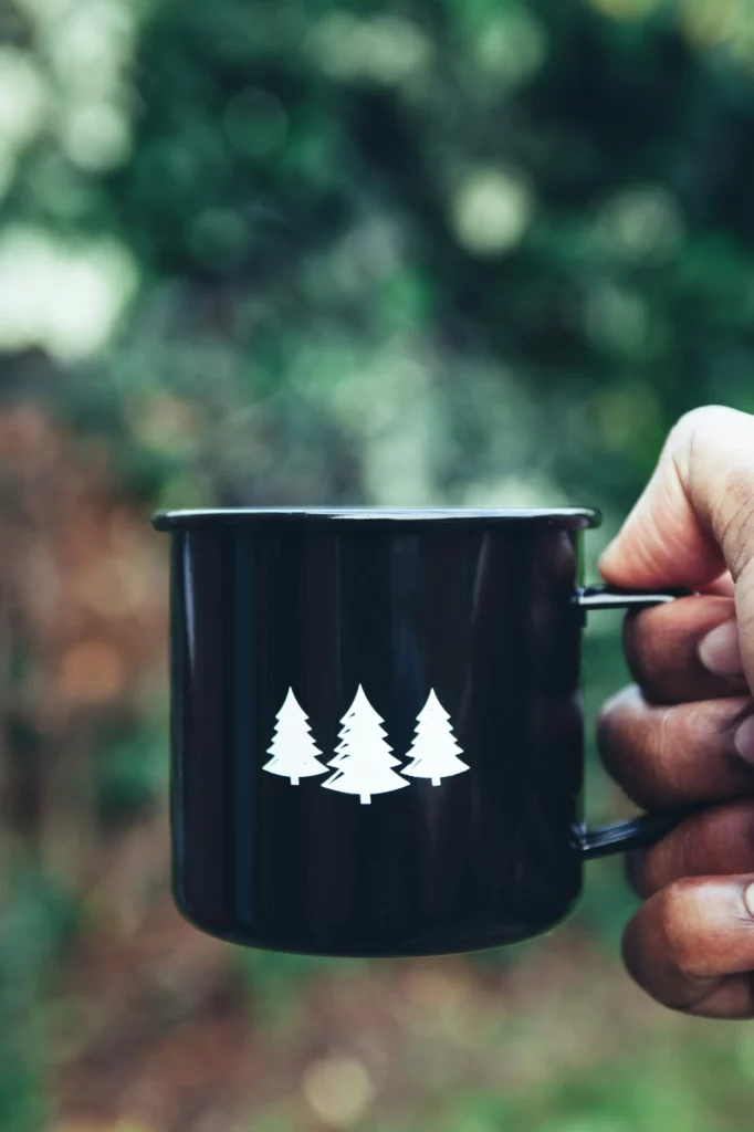 Reusable thermal mug for camping, part of essential outdoor gear